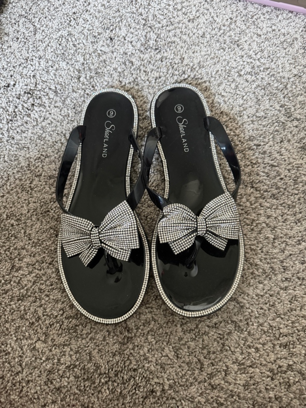 Shelaland Black Rhinestone Bow Jelly Flip-Flops for Women